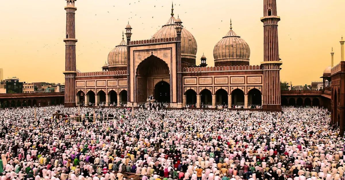 A large crowd gathers for prayer at the iconic Jama Masjid during Ramadan.